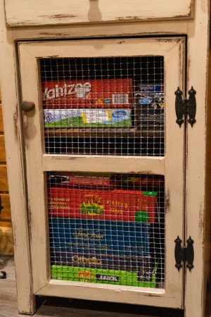 Selection of board games for all aged in the Riverglen game room storage area