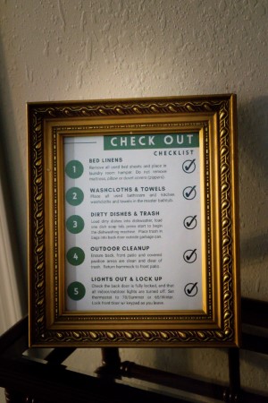 Check-out procedures checklist sheet located near the front door